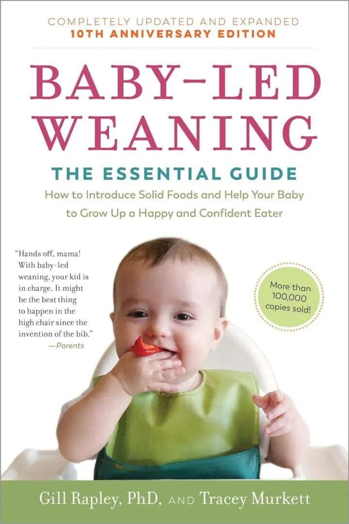Exploring Baby-Led Weaning and Traditional Spoon-Feeding 2 Cover of the book 'Baby-Led Weaning: The Essential Guide' by Gill Rapley and Tracey Murkett, featuring a baby eating solid food with a quote from Parents magazine and a note about over 100,000 copies sold.